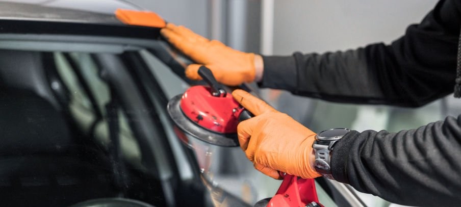 Auto Glass Repair and Replacement, close up. High quality photo
